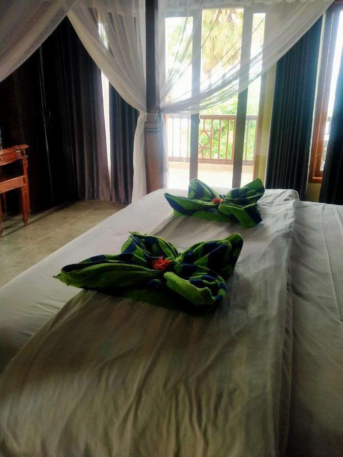 Coral Bay Bungalows Amed Esterno foto