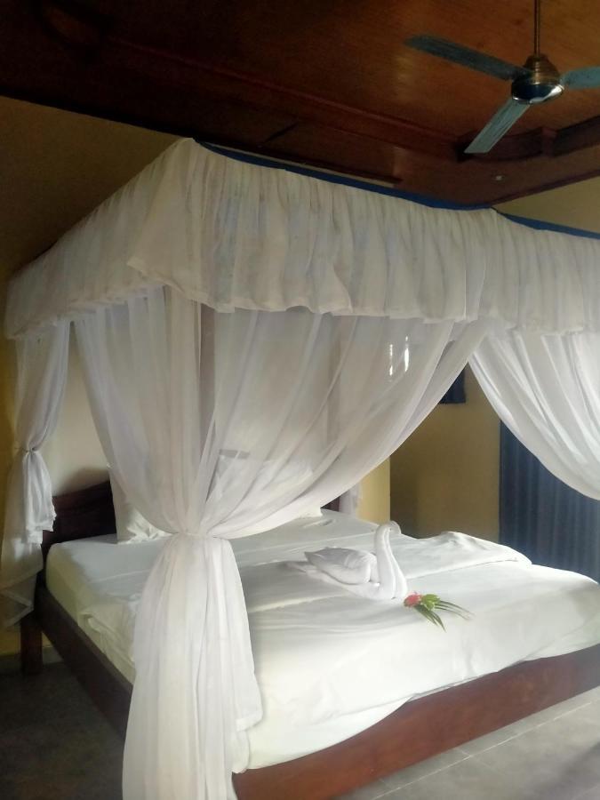 Coral Bay Bungalows Amed Esterno foto