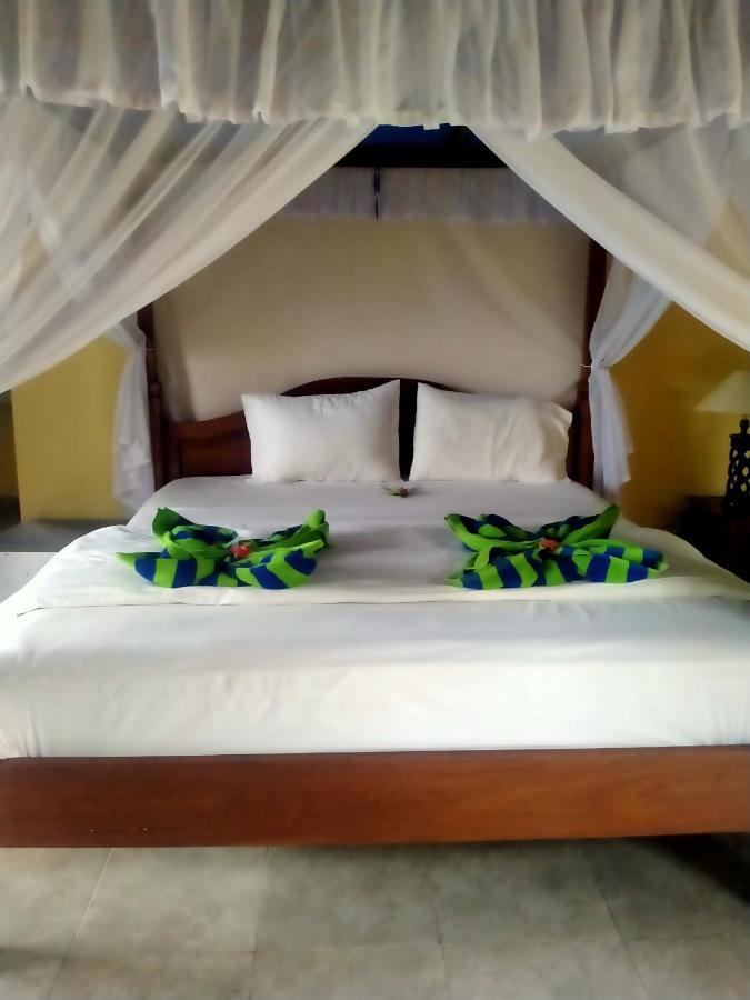 Coral Bay Bungalows Amed Esterno foto