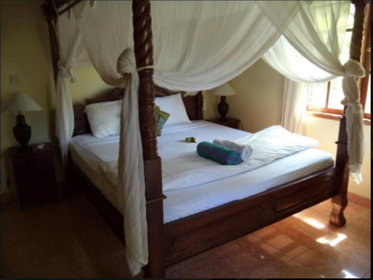 Coral Bay Bungalows Amed Esterno foto